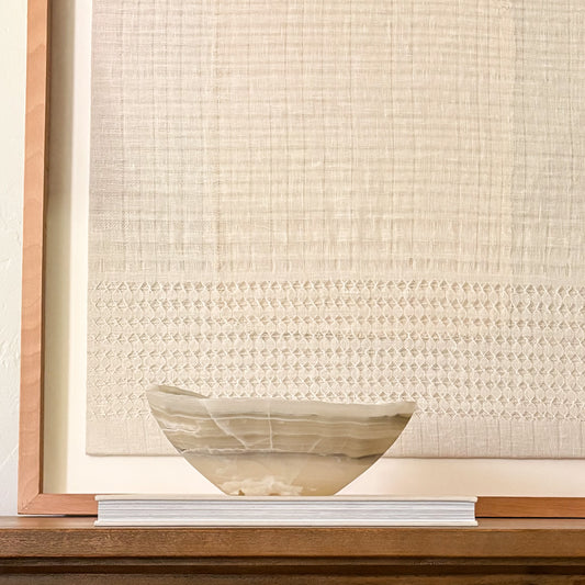 Hand-carved grey onyx bowl crafted from natural stone for luxury home décor.