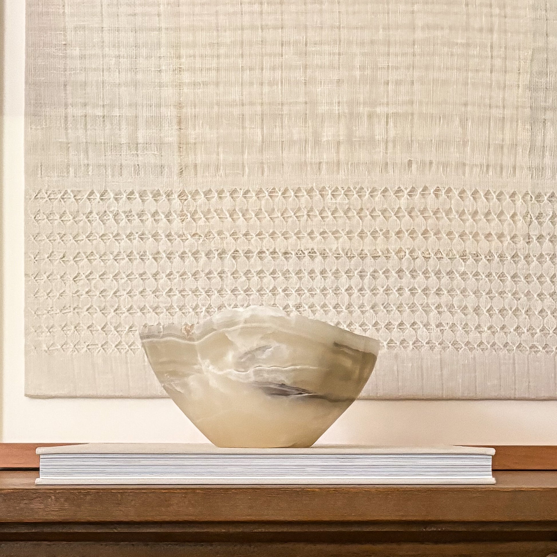 Luxury hand-carved grey onyx bowl featuring natural stone patterns and organic texture.