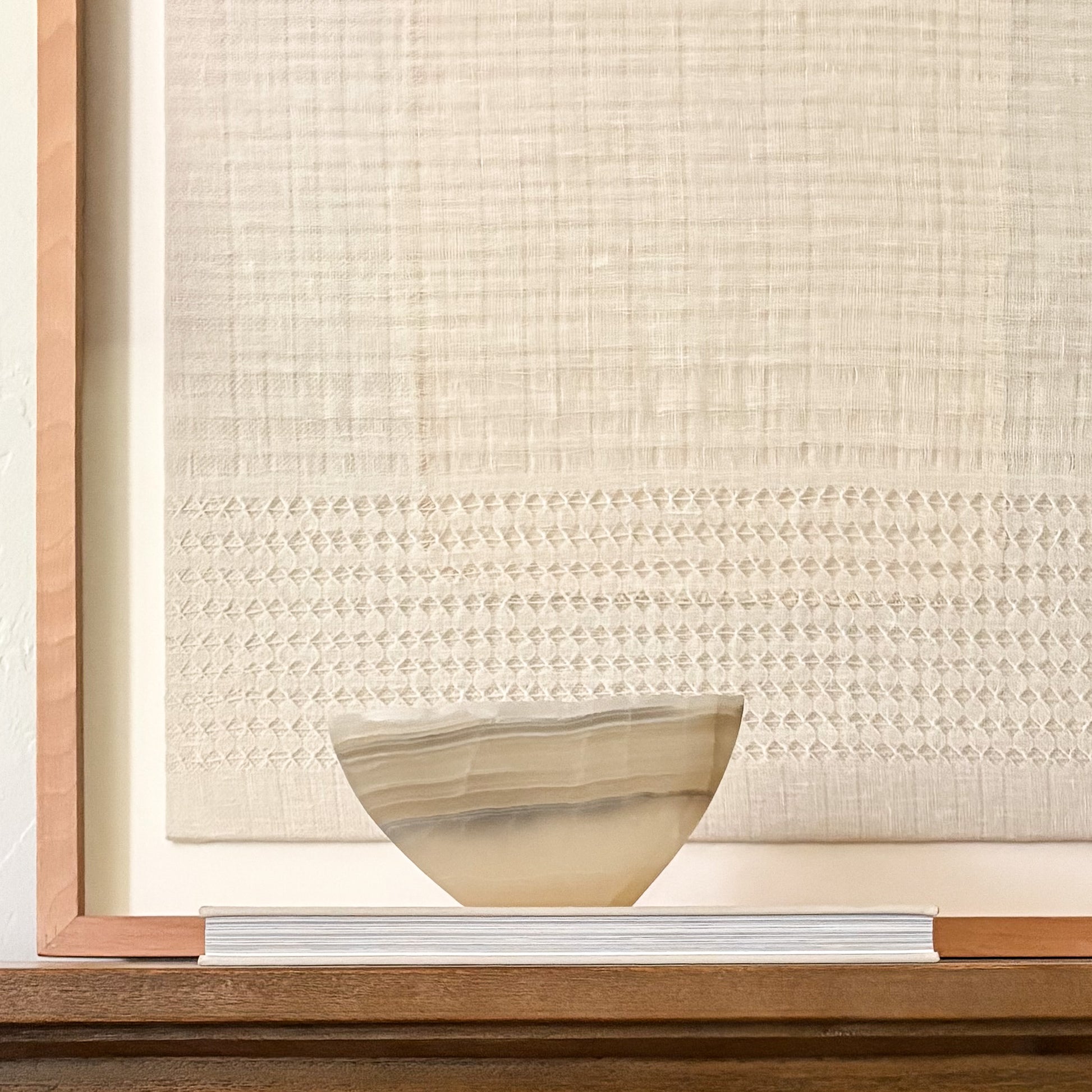 Decorative grey onyx bowl hand carved from natural stone with unique veining.