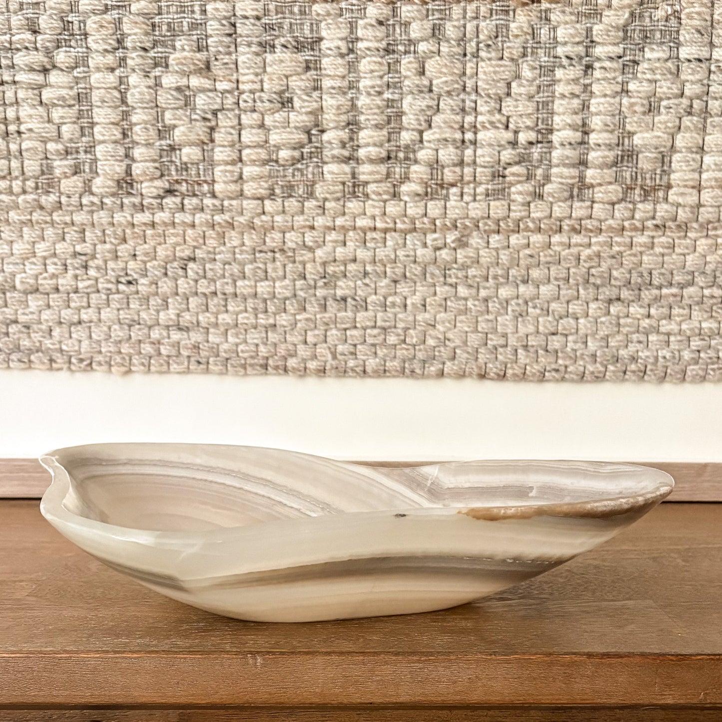 One-of-a-kind grey onyx bowl featuring organic veining and earthy tones