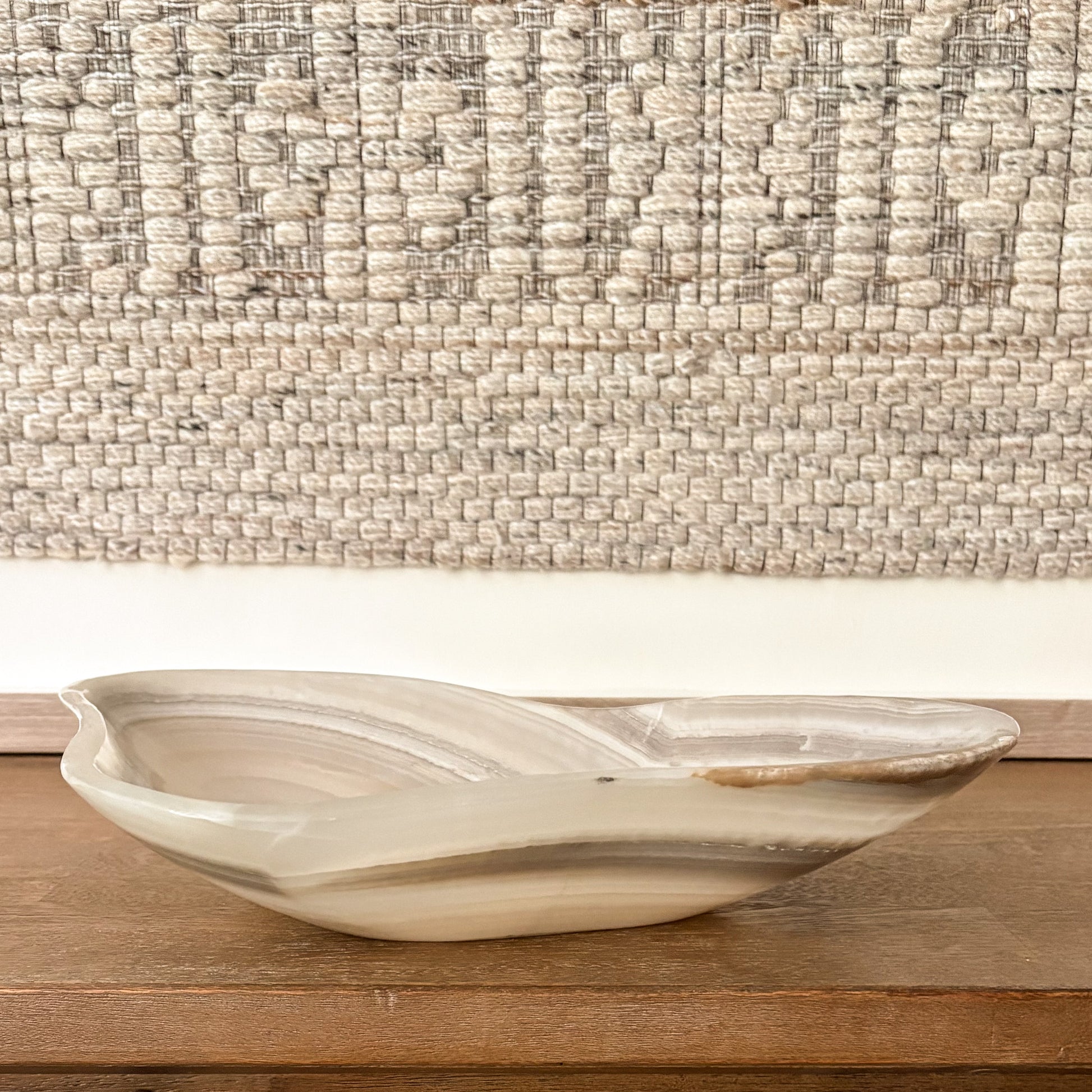 One-of-a-kind grey onyx bowl featuring organic veining and earthy tones