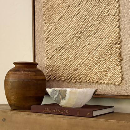 Contemporary hand-carved onyx bowl in warm olive tones