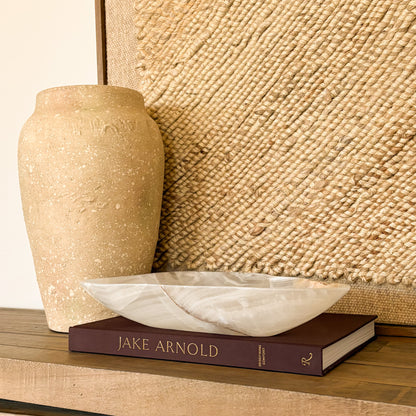 Decorative hand carved onyx bowl made from white and amber natural stone