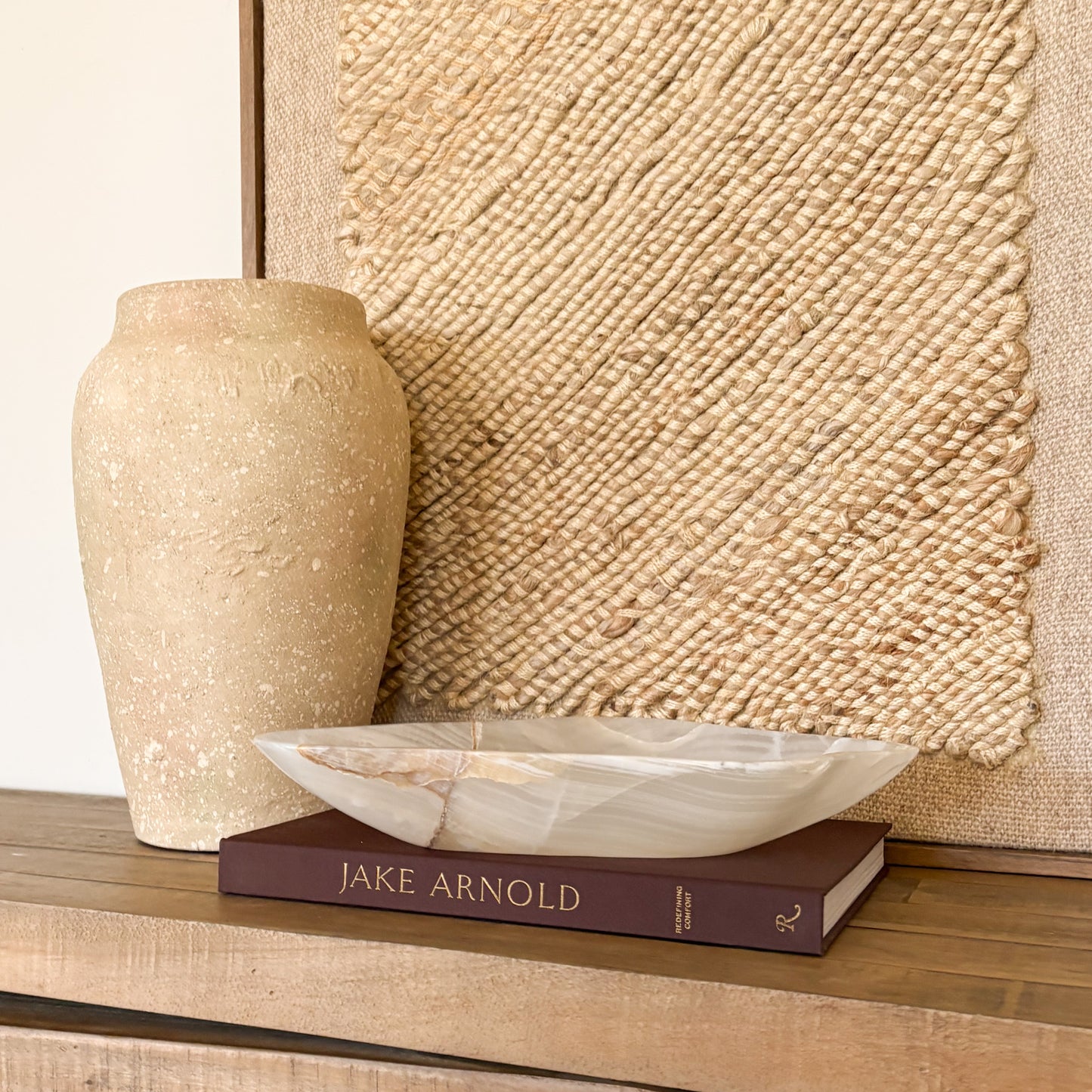 Luxury hand carved onyx bowl in white and amber tones for elegant home decor