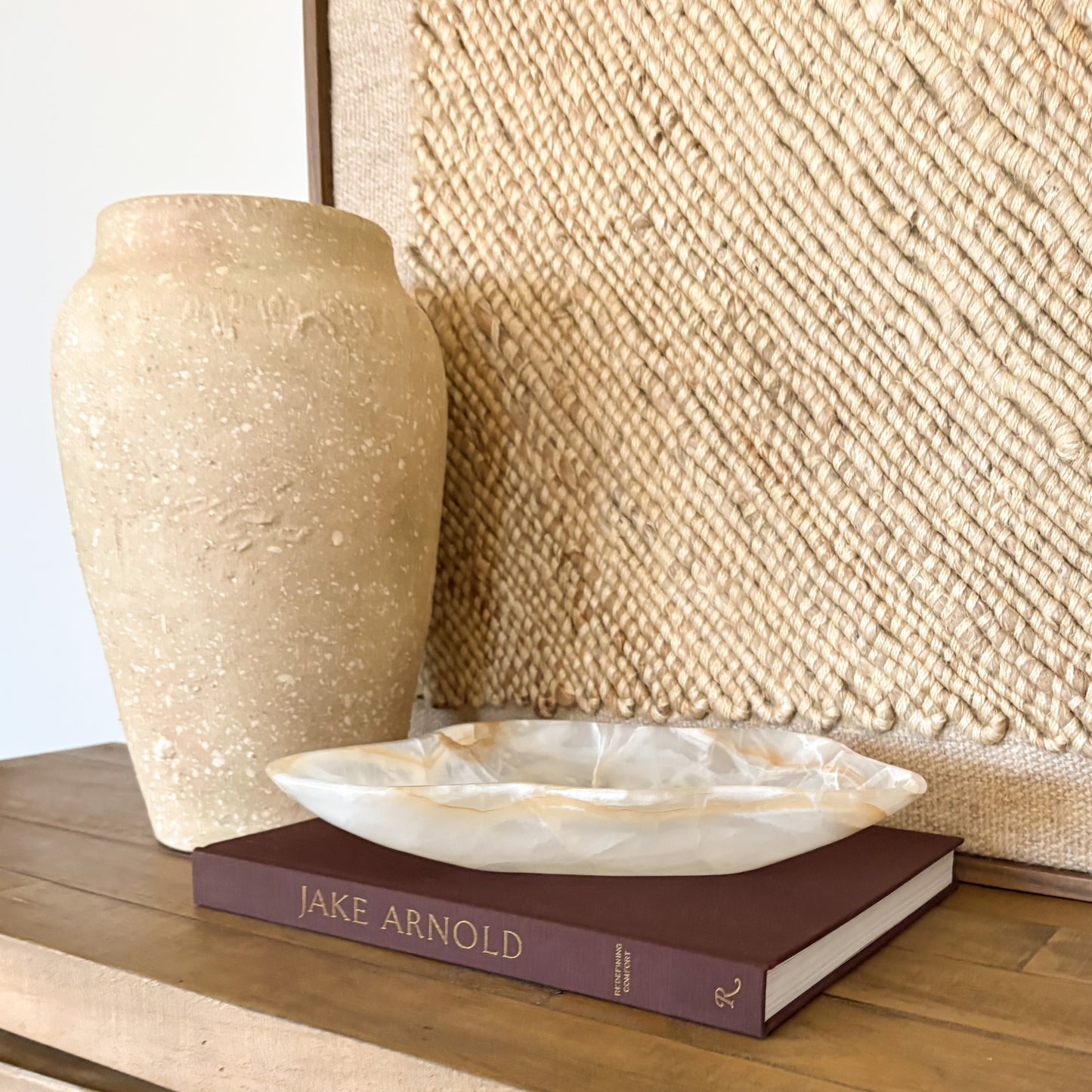 Luxury hand carved onyx bowl in white and amber tones for elegant home decor