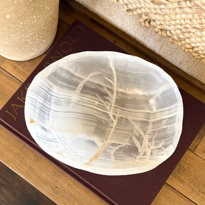 Artisan hand carved onyx bowl in translucent white stone