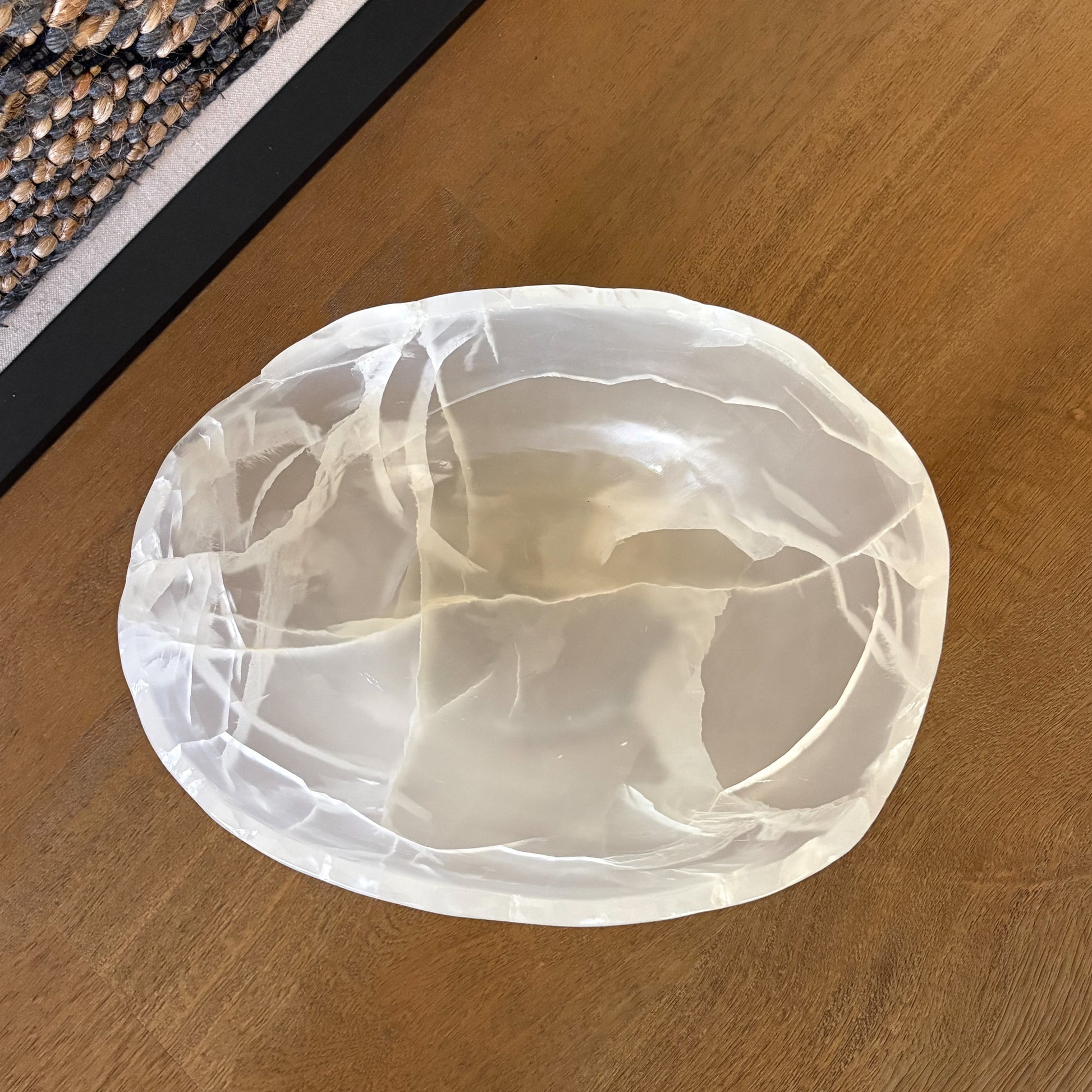 Artisan carved white onyx bowl with translucent marble-like texture