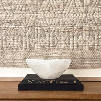 Hand-carved white onyx decorative bowl with natural stone veining