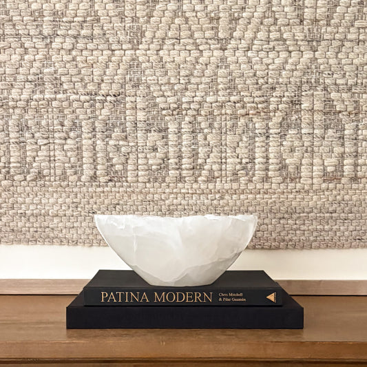 Hand-carved white onyx decorative bowl with natural stone veining