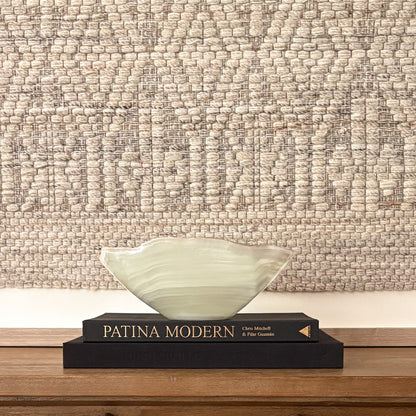 Hand-carved white onyx decorative bowl with natural stone veining