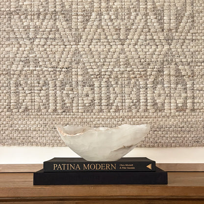 Hand-carved white onyx decorative bowl with natural stone veining