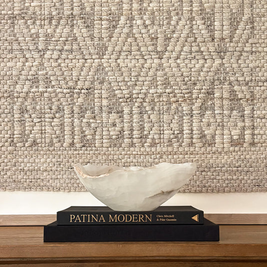 Hand-carved white onyx decorative bowl with natural stone veining