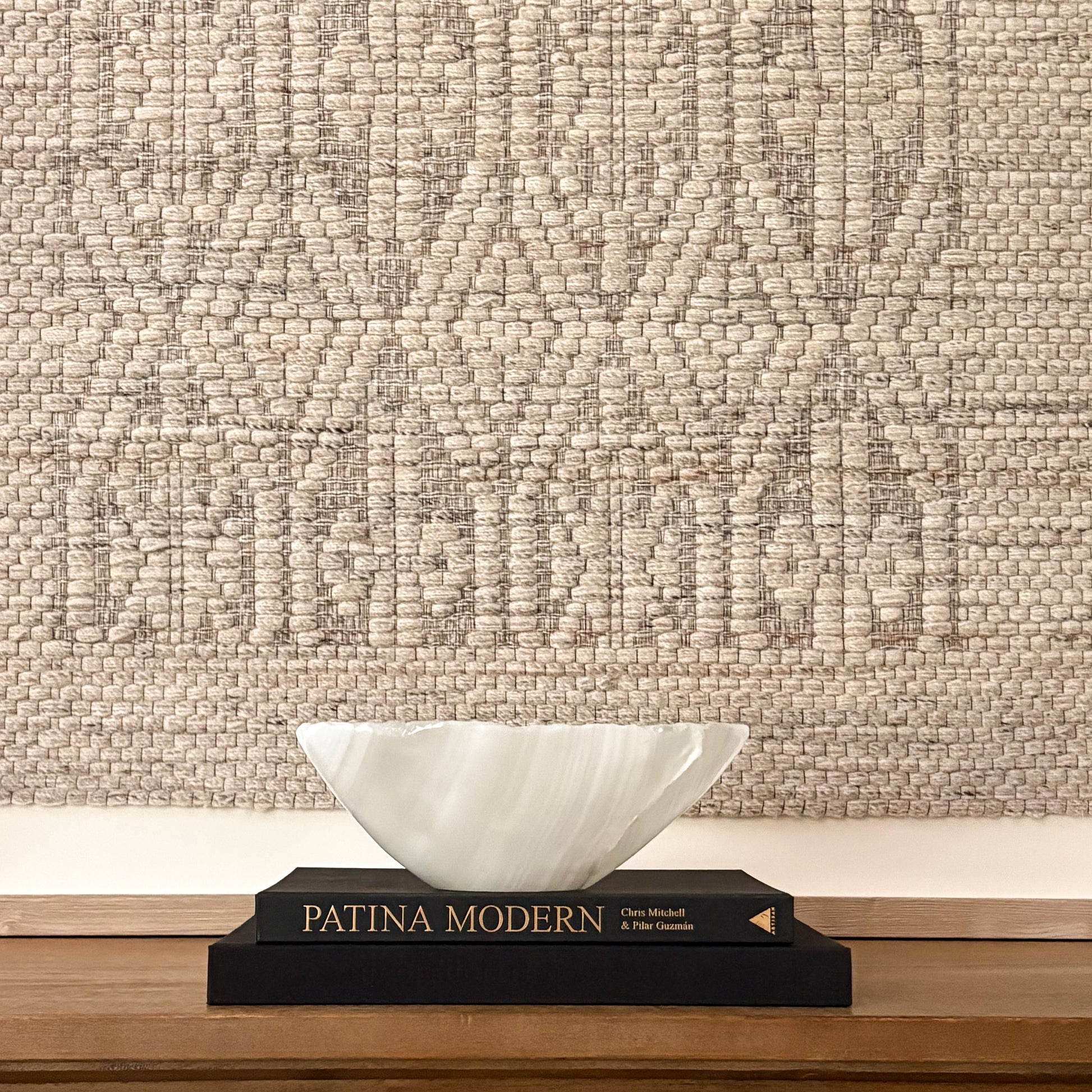 Hand-carved white onyx decorative bowl with natural stone veining