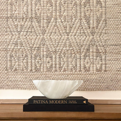 Hand-carved white onyx decorative bowl with natural stone veining