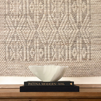 Decorative white onyx bowl with polished finish and natural veining