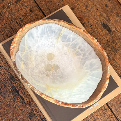 Luxury white onyx bowl featuring unique hand-carved details and smooth texture