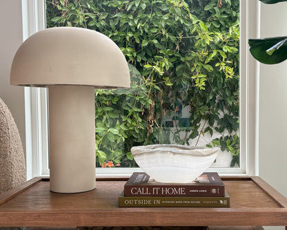 Hand-carved white onyx bowl with natural stone veining