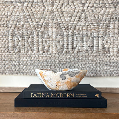 Decorative zebra calcite crystal bowl with organic edge and layered mineral banding