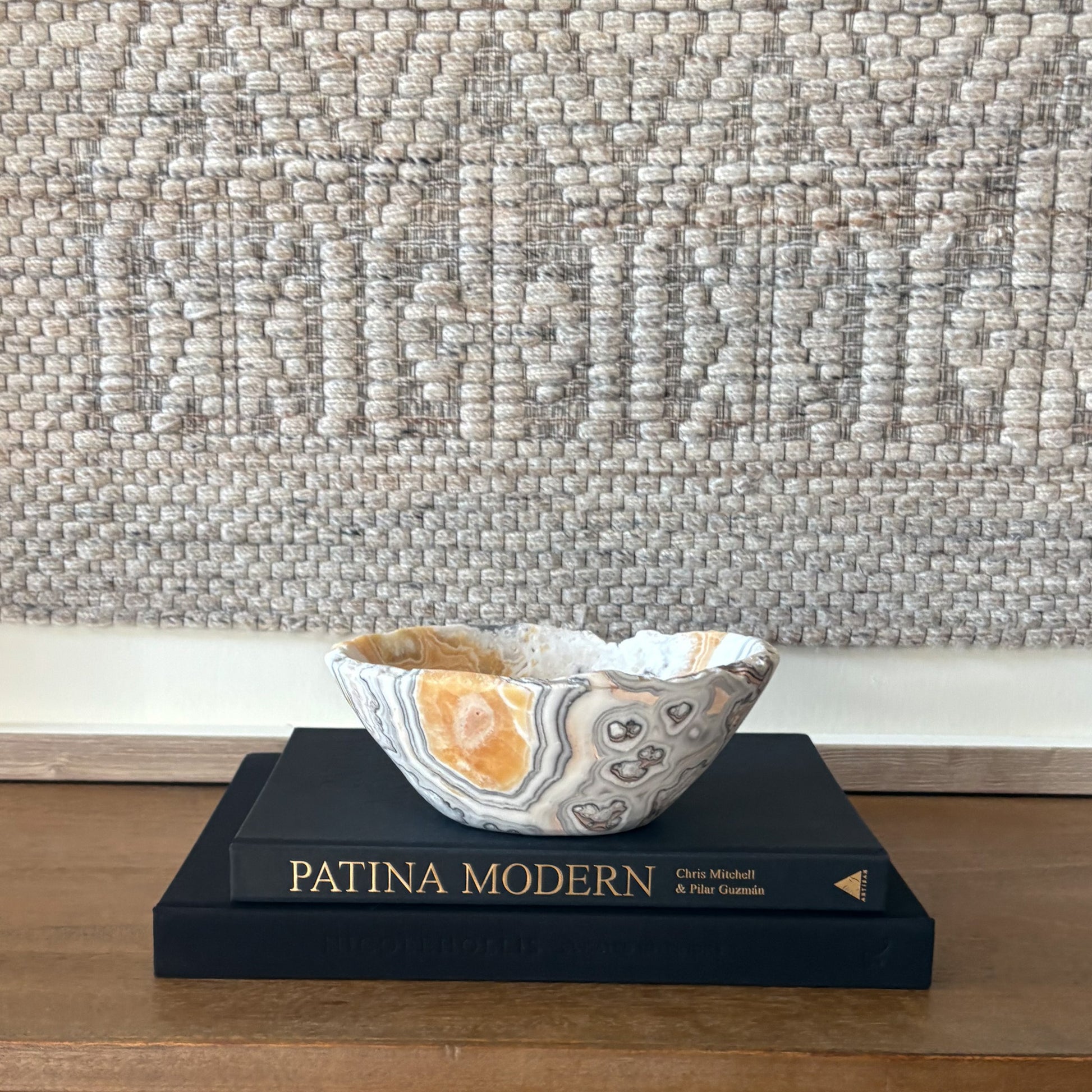 Sculptural zebra calcite bowl centerpiece with natural crystal formations and banded pattern
