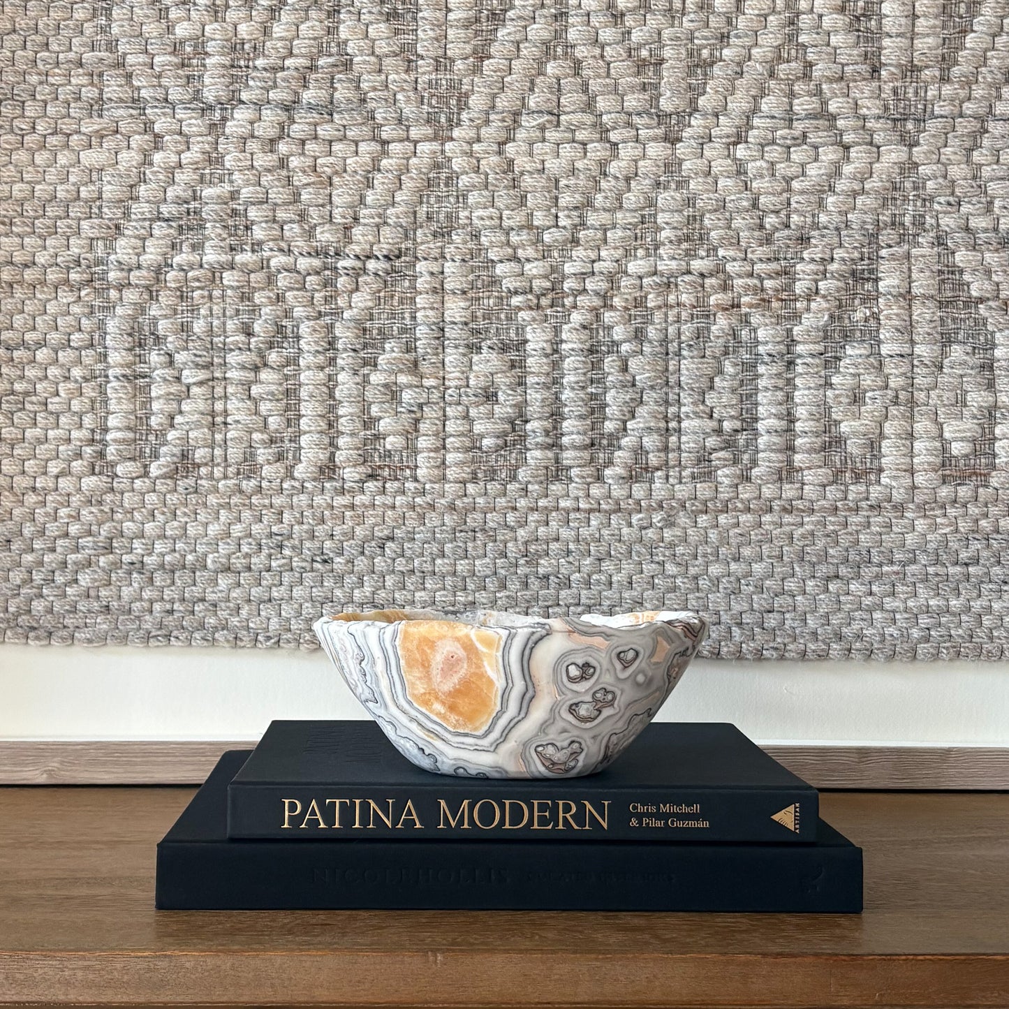 Modern luxury decor featuring hand carved zebra calcite bowl with high polish finish