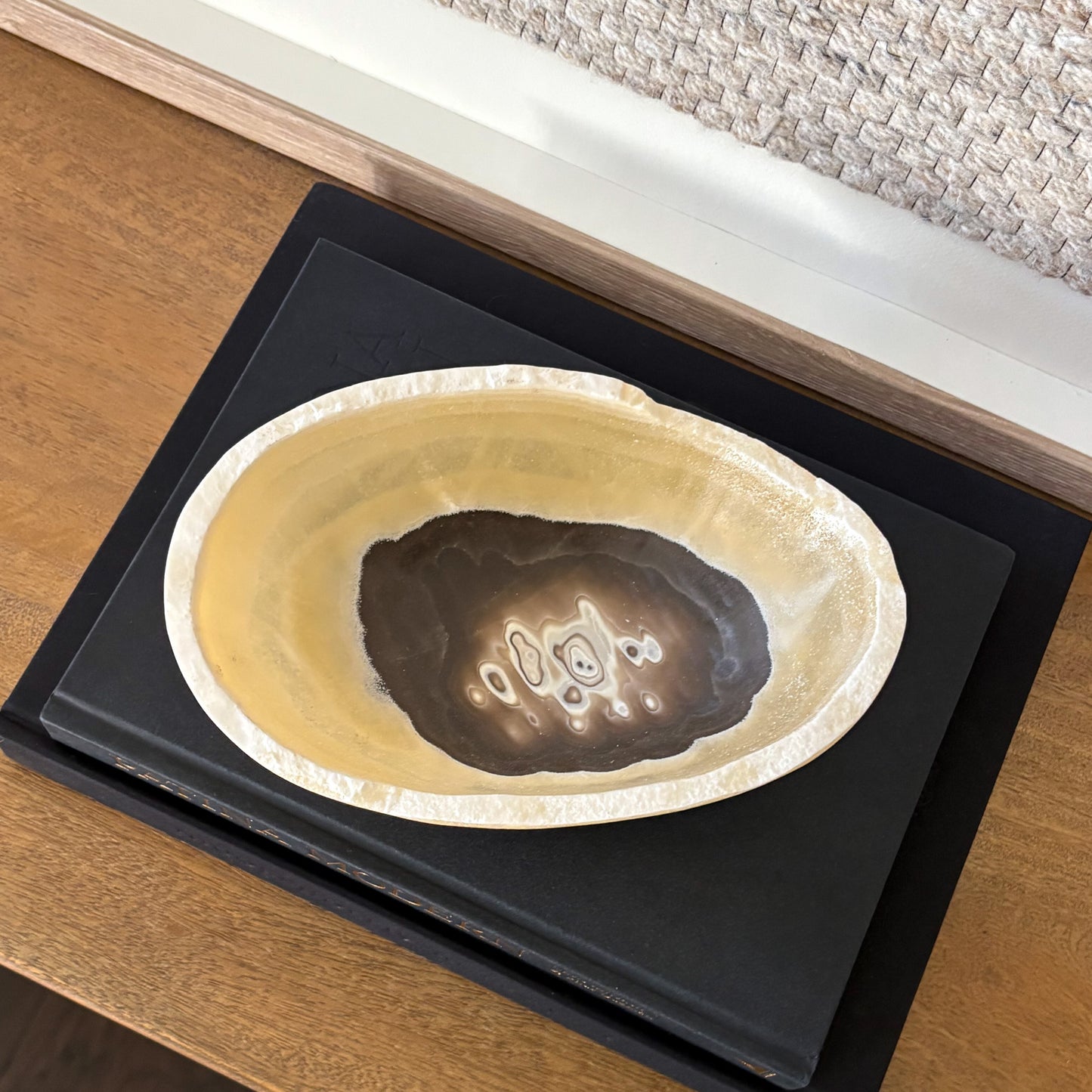 Contemporary home styling featuring hand carved zebra onyx stone bowl