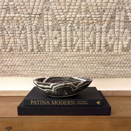 Hand-carved zebra onyx bowl with natural stripes