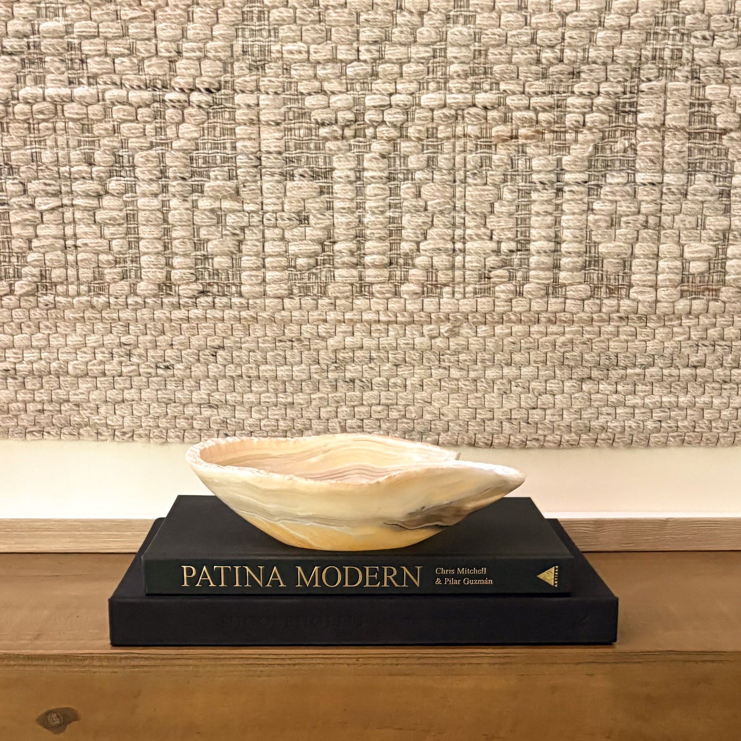 Premium hand-carved zebra onyx bowl featuring striking natural banding and polished stone texture
