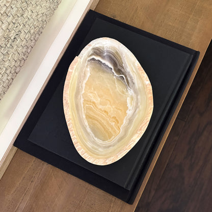 Hand-carved zebra onyx bowl with natural stripes