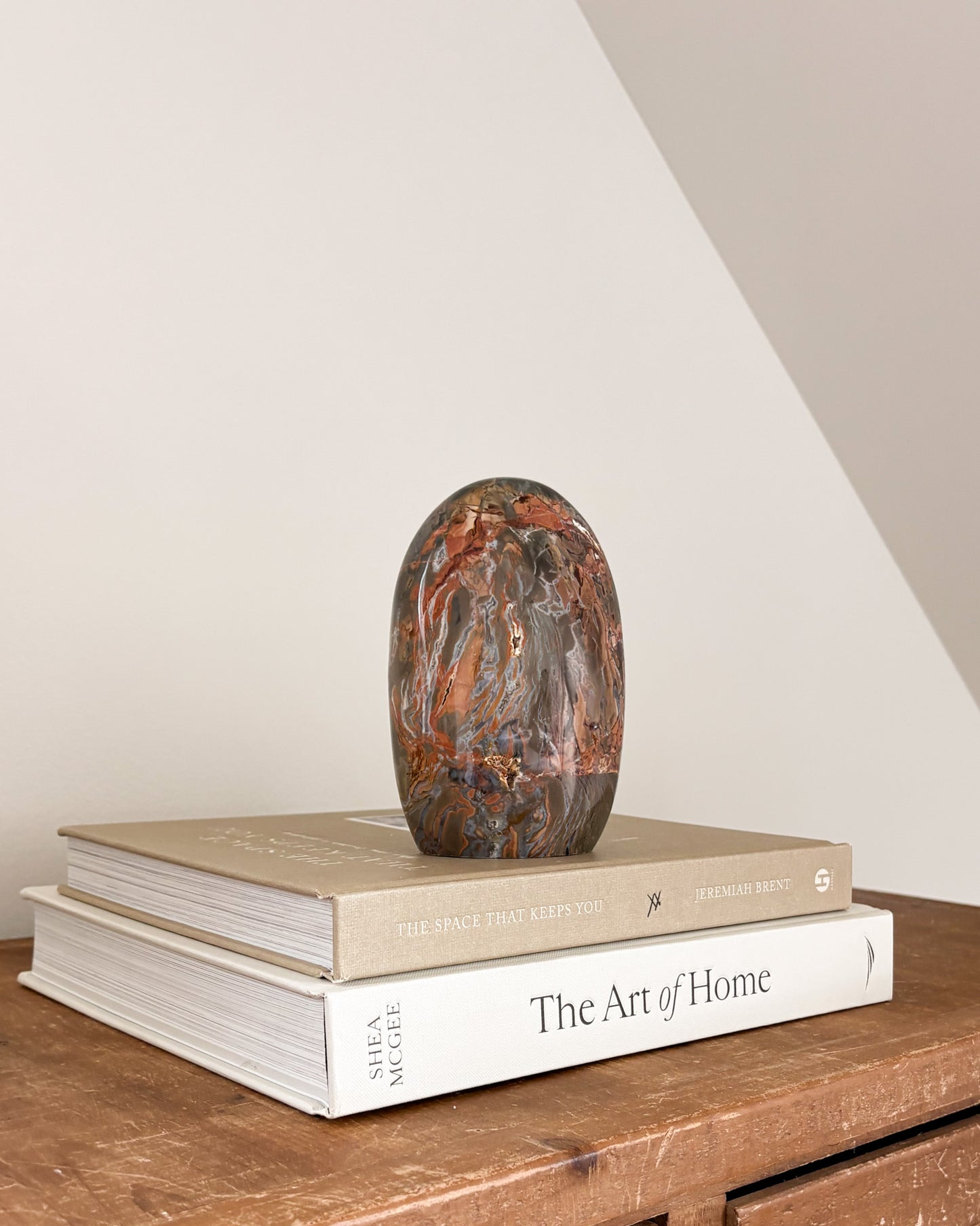 Natural jasper stone sculpture with polished freeform shape