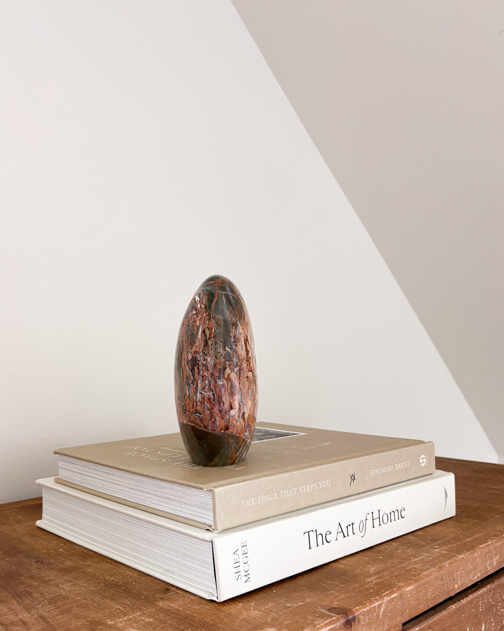 Ibis Jasper sculpture with organic brown and neutral tones
