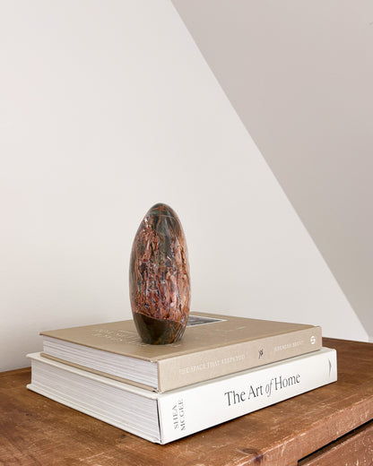 Ibis Jasper sculpture with organic brown and neutral tones