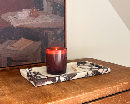 Calacatta Viola marble tray styled on a console table