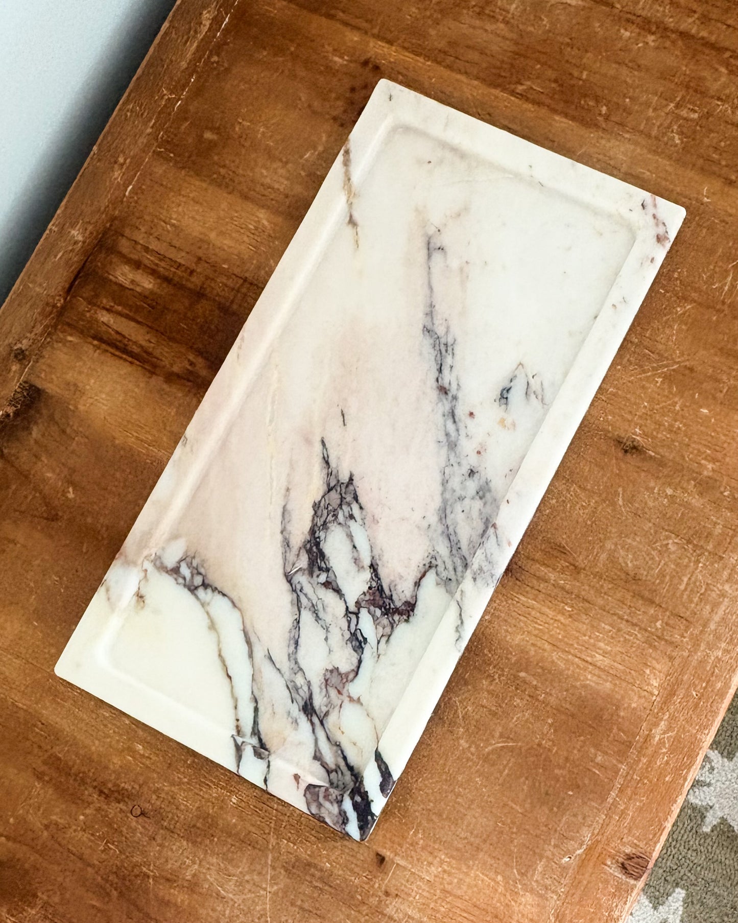 Natural Calacatta Viola marble tray with rich violet and burgundy veining