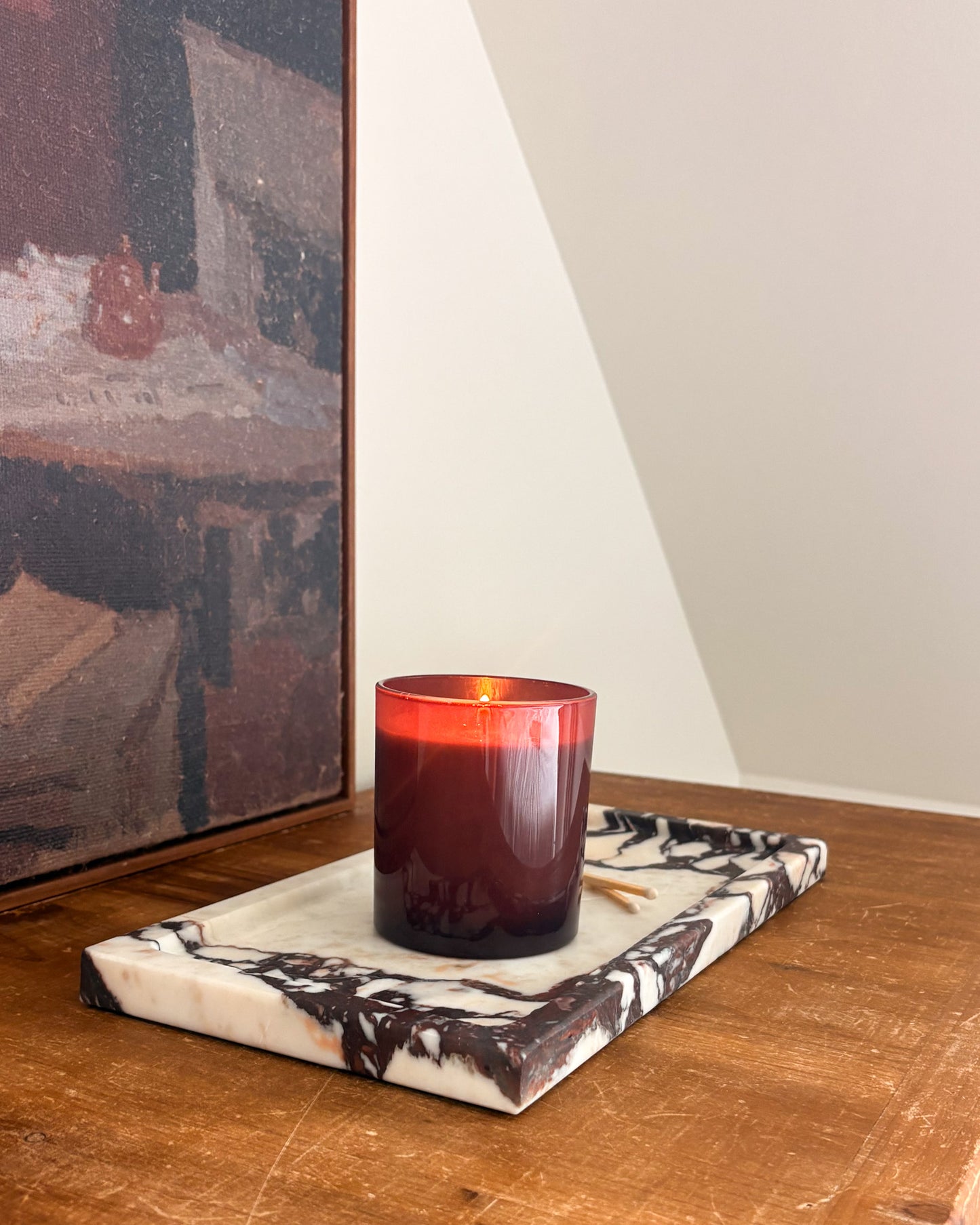 Calacatta Viola marble ottoman tray with dramatic burgundy veining