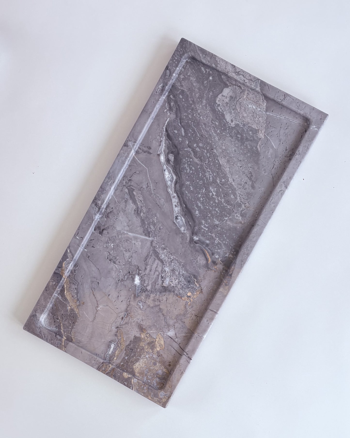 Decorative natural marble tray in cappuccino marble with velvet-lined underside