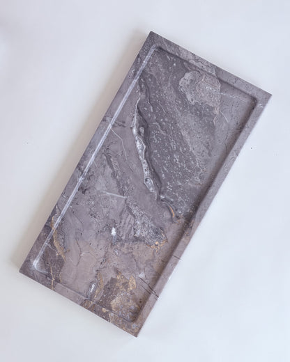 Decorative natural marble tray in cappuccino marble with velvet-lined underside