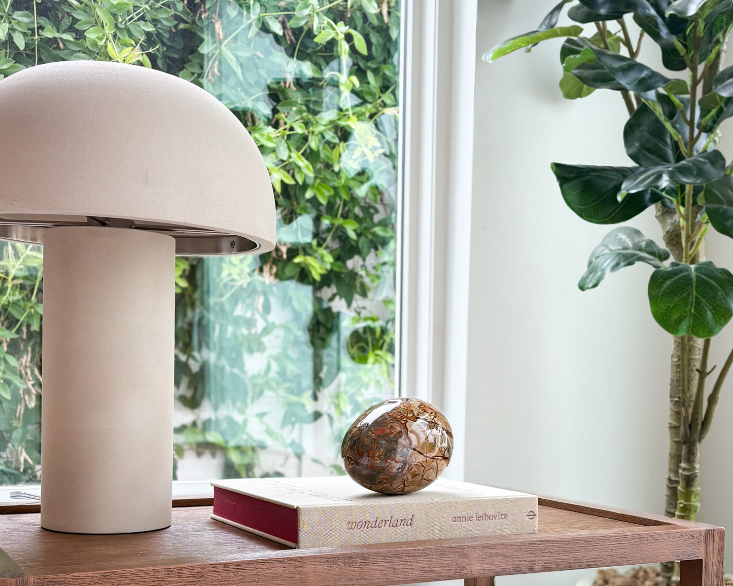 Sculptural large Ibis Jasper egg showcasing unique organic patterns and warm neutral tones
