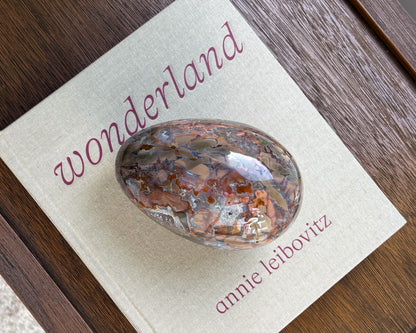 One-of-a-kind Ibis Jasper egg displayed as a luxury natural stone home décor accent