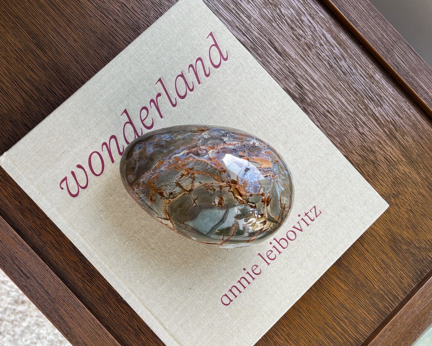 Decorative polished Ibis Jasper egg showcasing natural brown, cream, and rust-colored stone patterns