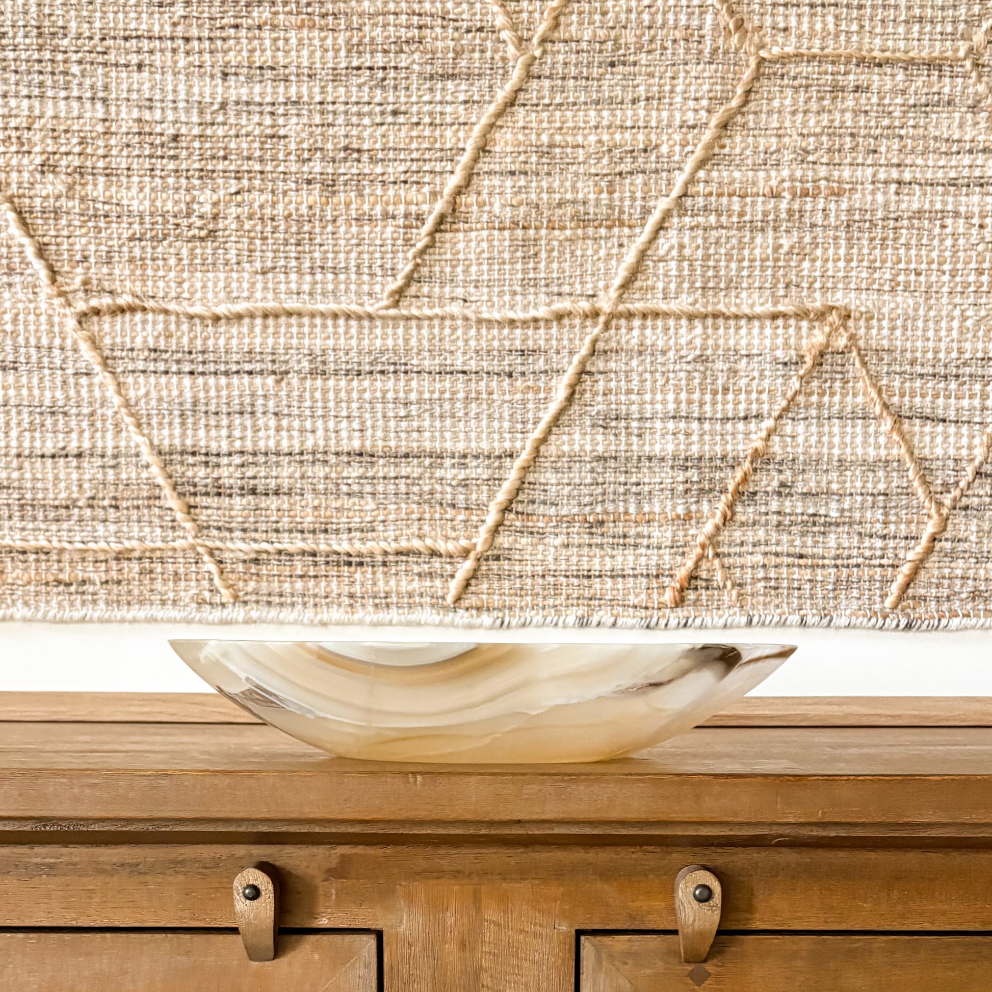 Decorative amber onyx bowl handcrafted from natural stone with smooth polished finish