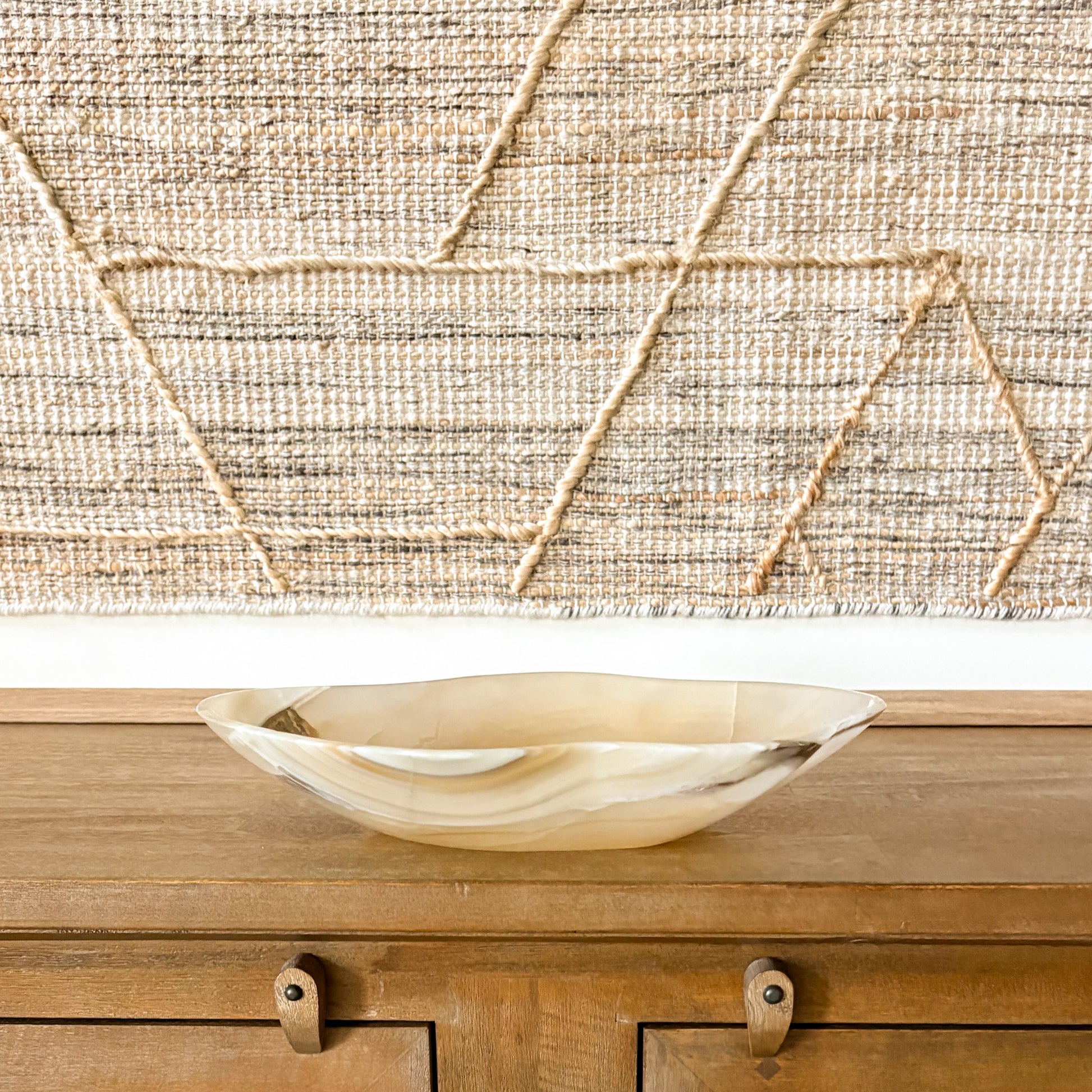 Polished amber onyx decorative bowl with unique veining