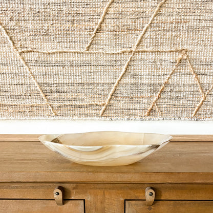 Polished amber onyx decorative bowl with unique veining