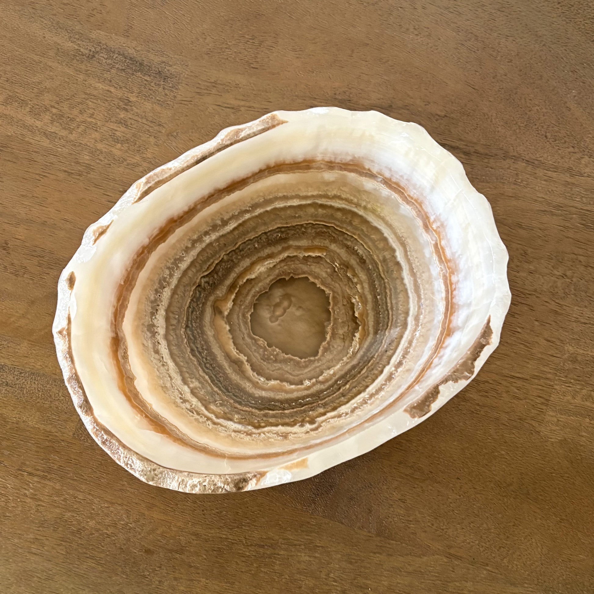 Premium hand-carved amber onyx bowl with smooth polished surface
