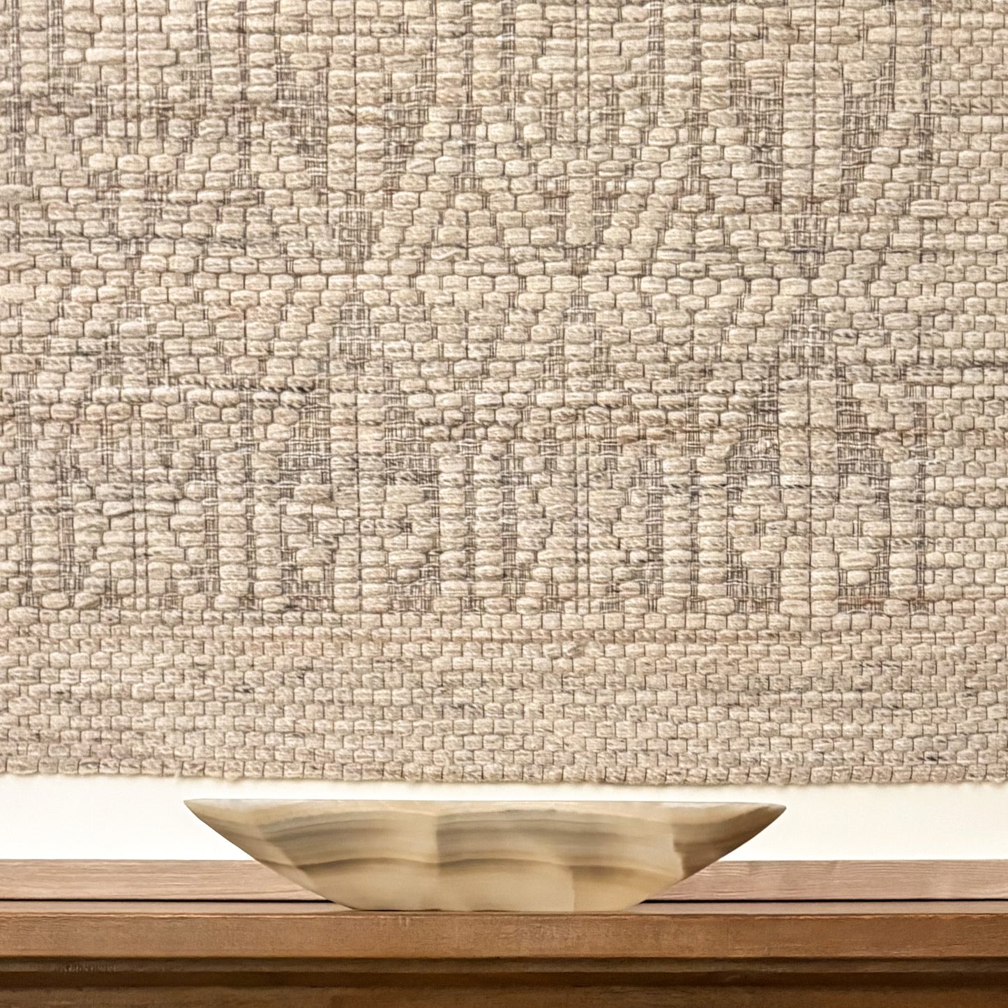 Hand-carved large grey onyx centerpiece bowl featuring natural stone patterns for elevated interior styling.