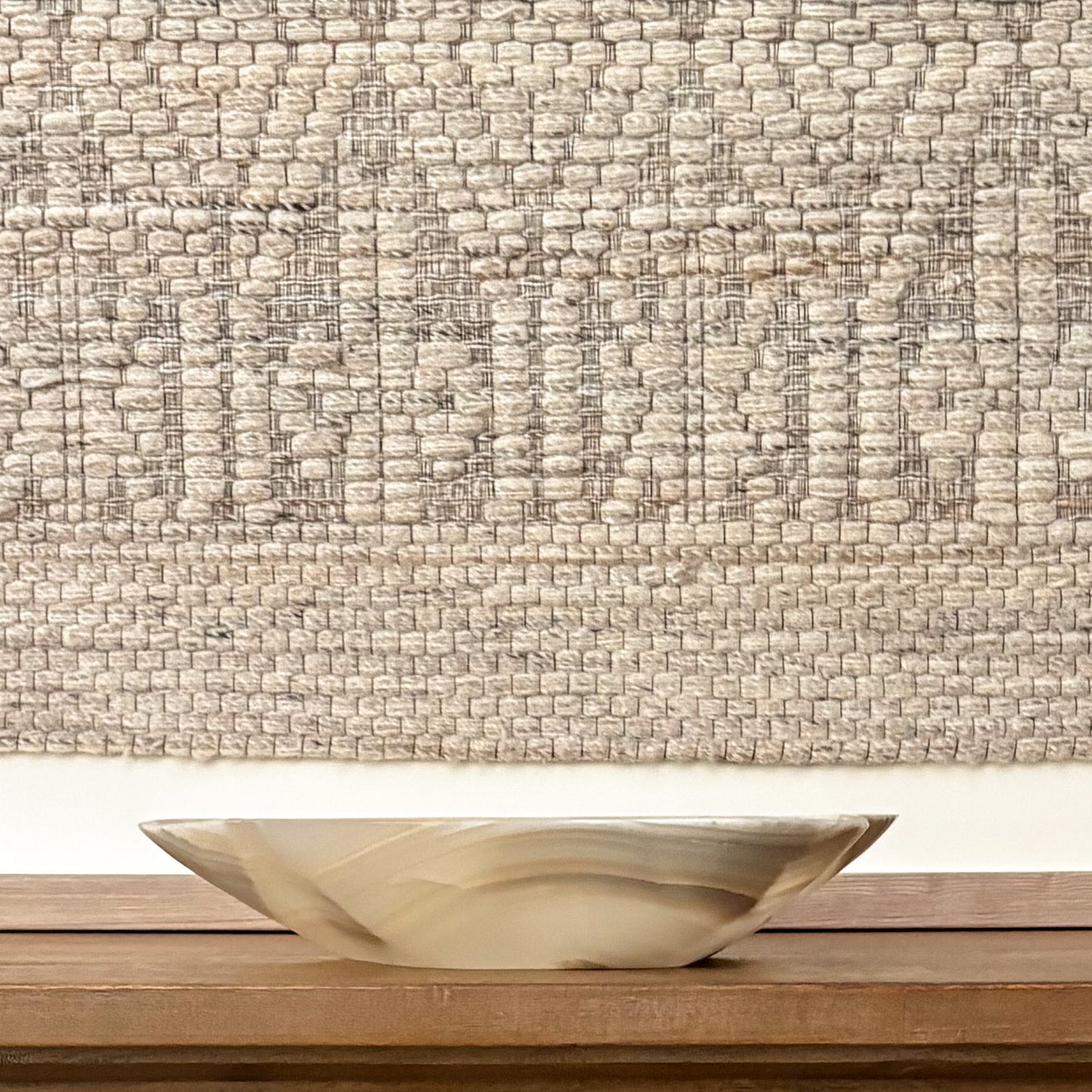 Luxury large grey onyx bowl handcrafted from natural stone with distinctive veining and organic texture.