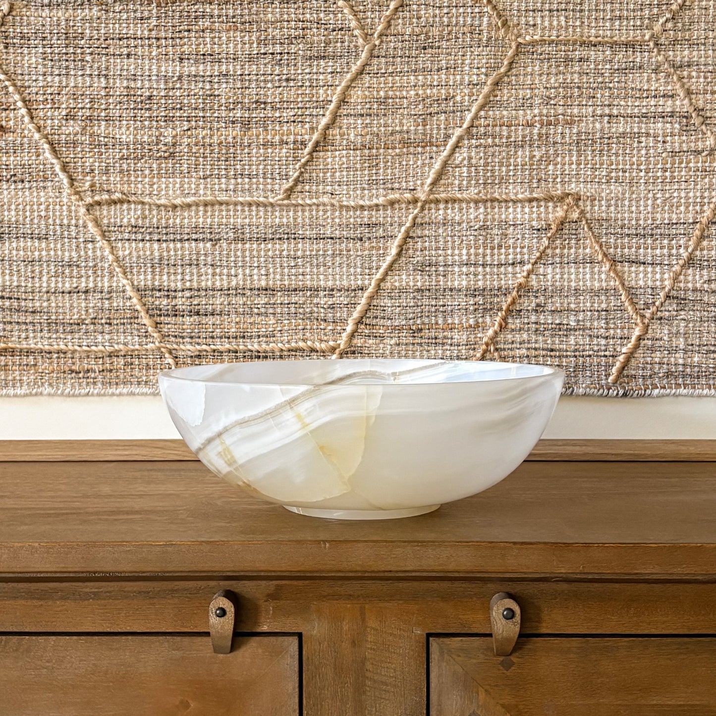 decorative white onyx bowl entryway table styling high-end home