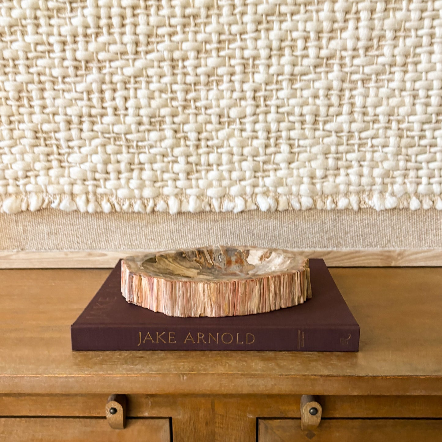 Natural petrified wood bowl displayed in modern organic home decor