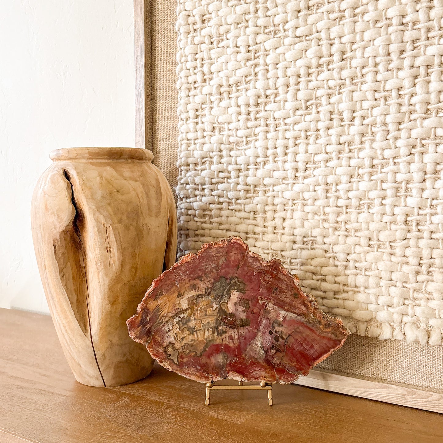 Red and amber Madagascar petrified wood slab showcased as home decor accent