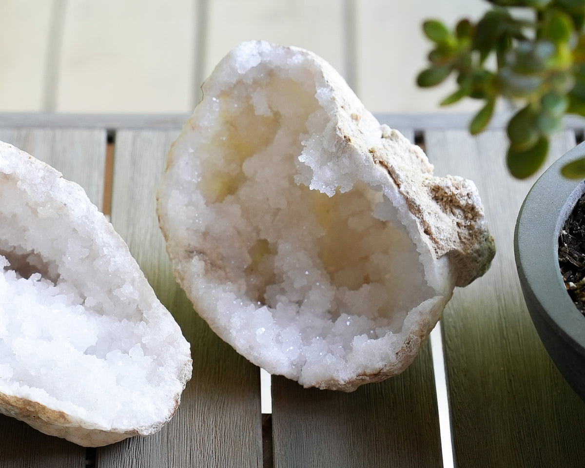 Natural Moroccan quartz geode halves showing unique crystal formations and druzy texture