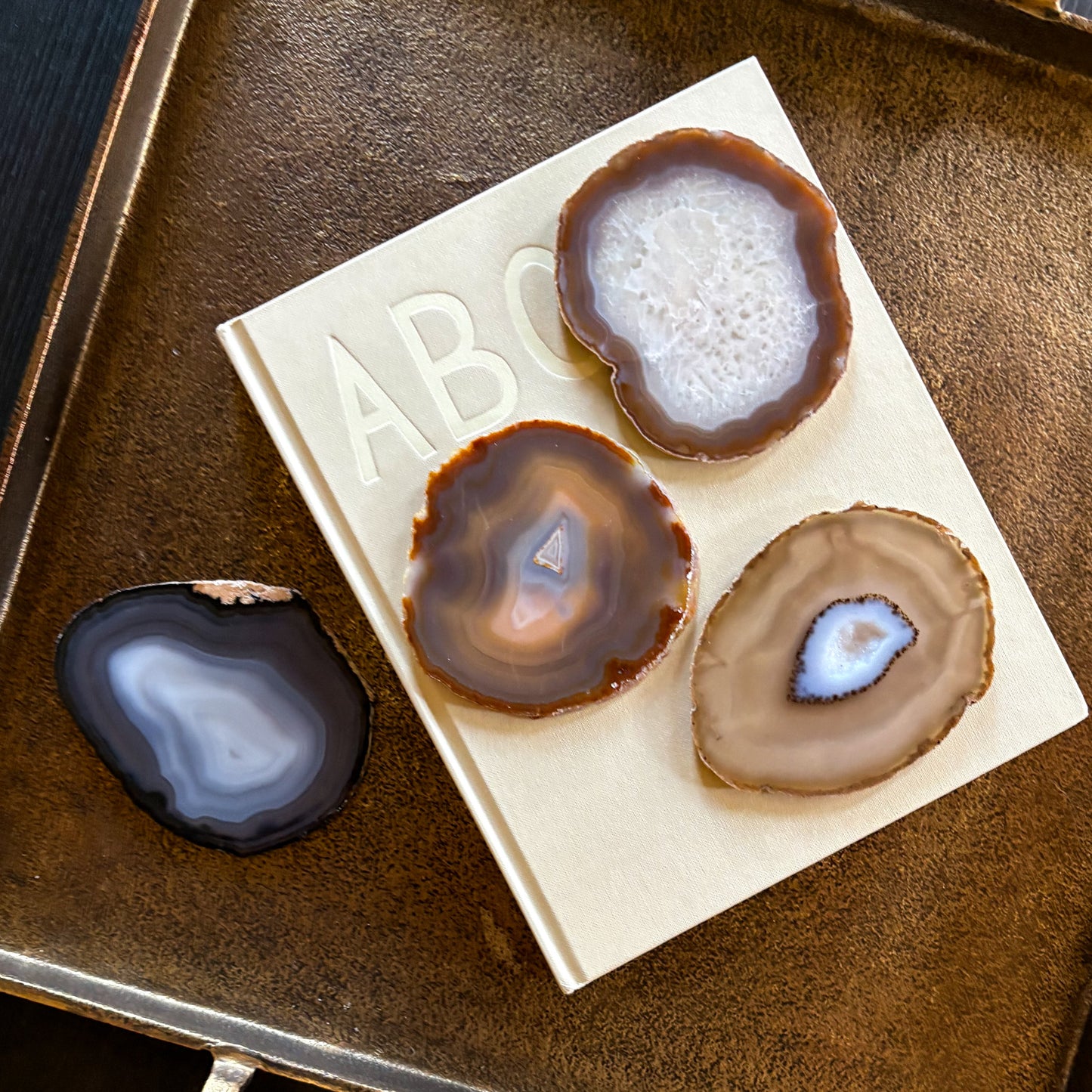 Real gemstone coasters displaying natural crystal textures
